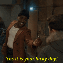 a man says cos it is your lucky day in yellow letters