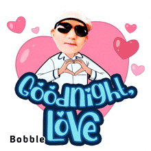 a cartoon of a man making a heart with his hands and the words goodnight love behind him