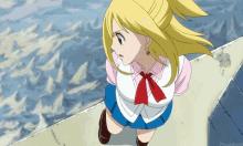 a girl with blonde hair and a red tie is standing on a pier