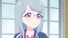 a girl with glasses and gray hair is looking at the camera