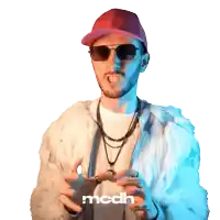 a man wearing sunglasses and a fur coat with the word mcdh on the bottom right