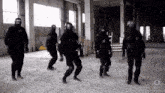 a group of soldiers are dancing in a room with a watermark that says vkcomfreelord