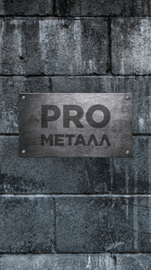 a brick wall with a metal sign that says pro metala