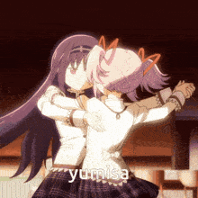two anime girls are hugging and the word yumisa is on the bottom of the image