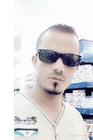 a man wearing sunglasses and a shirt that says ' a ' on it