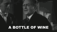 A Bottle Of Wine George Kingsley GIF - A Bottle Of Wine George Kingsley Black Friday GIFs