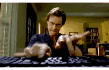Typing Jim Carrey GIF - Typing Jim Carrey Fast Hands GIFs