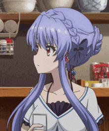 a girl with blue hair is holding a card