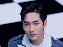 a close up of a man 's face with the words bumon tumblr in the bottom right corner