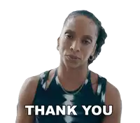 a woman is giving a thank you sign