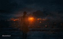 a painting of a man standing in front of a fire with illusive soul written below it