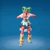 a girl with a red face and green hair is standing with her arms outstretched and pointing