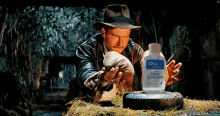 Indiana Jones Hand Sanitizer GIF - Indiana Jones Hand Sanitizer Clean GIFs