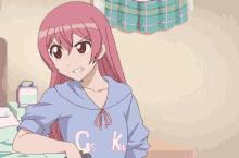 a girl with pink hair is holding a gun and wearing a shirt that says gskw