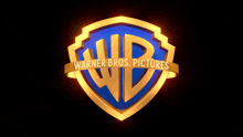 the logo for warner bros. pictures is shown on a dark background