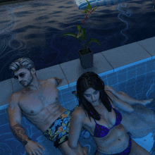 a man and a woman are laying in a pool with a plant in the background
