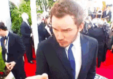 Me Trying On A Suit On Those 3 Panel Mirrors GIF - Chris Pratt Mirror Camera GIFs