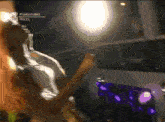 a blurry image of a person dancing with the words #gangassmode mtv.es visible