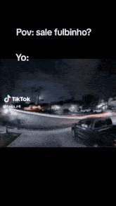 a video of a car driving down a street at night with the caption " pov : sale fulbinho "
