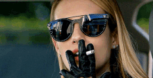 Emma Roberts Smoking GIF - Emma Roberts Smoking Look Away GIFs