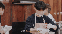 a man wearing an apron says han then am i calcior