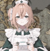 a girl with horns is wearing a nurse 's outfit and holding a game controller