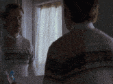 Lars And The Real Girl Looking In The Mirror GIF - Lars And The Real Girl Looking In The Mirror GIFs