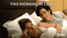 a man and a woman are laying in bed with the words this morning in clark above them
