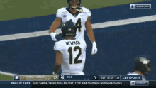 a football player with the number 12 on his jersey