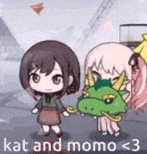two little girls are standing next to each other holding a green dragon head .