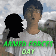 a poster for armed forces day with a silhouette of a soldier