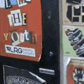 a locker with a red sign that says the youth on it .