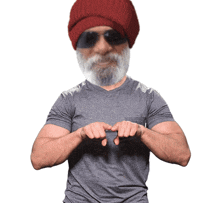 a man with a beard wearing a hat and sunglasses