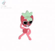 a cartoon strawberry with arms and legs and a flower on its head .