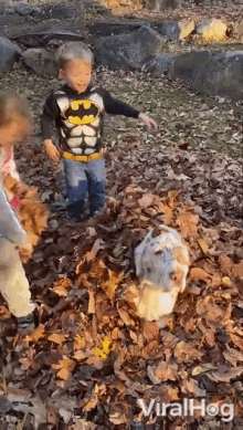 Dog Getting Covered With Leaves Kids Playing With Dog GIF