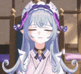 a girl with long blue hair and a purple headband is sitting in front of a bed .