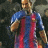 a soccer player wearing a nike shirt and gloves