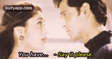 a man and a woman are looking at each other and the man is saying " you have "