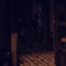 a blurry picture of a person walking down stairs