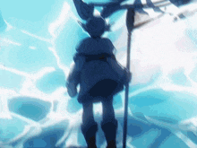 a silhouette of a person standing in the water