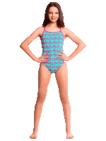 a young girl wearing a pink swimsuit with a pattern of cats on it