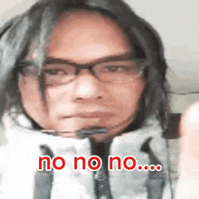 a man wearing glasses and a white jacket says no no no ...