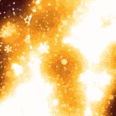 a close up of a fire with a lot of sparks coming out of it