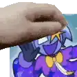 a person is touching a picture of a cartoon character with their hand .