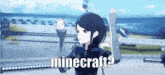 a girl is standing on a stage with her arms in the air and says minecraft .