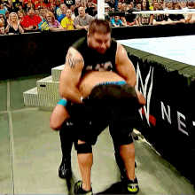 Kevin Owens Powerbomb GIF - Kevin Owens Powerbomb John Cena GIFs