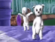 two white dogs are standing next to each other on a blue surface .