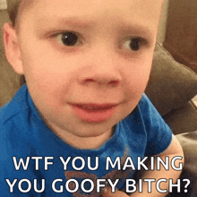 a young boy is making a funny face and says wtf you making you goofy bitch .