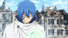 a man with blue hair is holding a green object