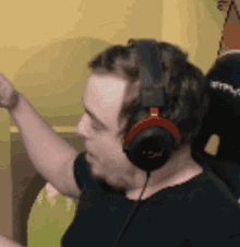 a man wearing a pair of headphones with the word hyper on them